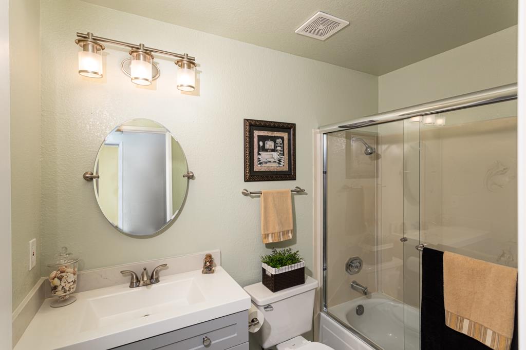 93 Shaniko Common, Unit 24 Fremont, CA 94539 - Photo 17 of 25 a bathroom with a sink a toilet and shower
