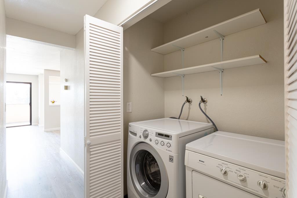 93 Shaniko Common, Unit 24 Fremont, CA 94539 - Photo 18 of 25 a utility room with dryer and washer
