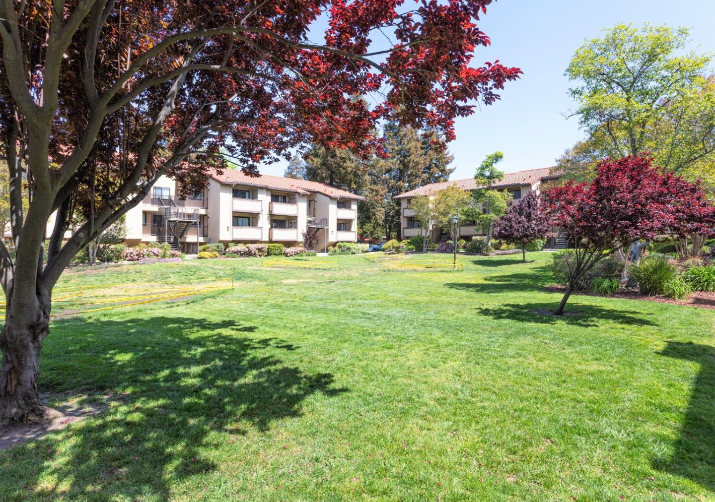 93 Shaniko Common, Unit 24 Fremont, CA 94539 - Photo 25 of 25 a view of a house with a big yard and large trees