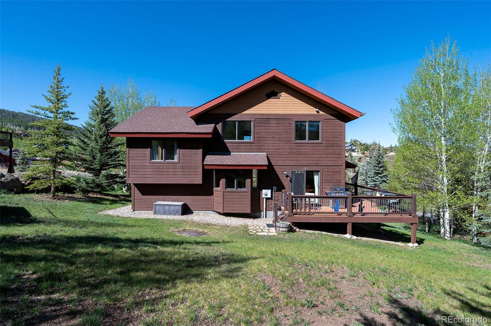 290 Village Road Granby, CO 80446 - Photo 34 of 45 a front view of a house with garden