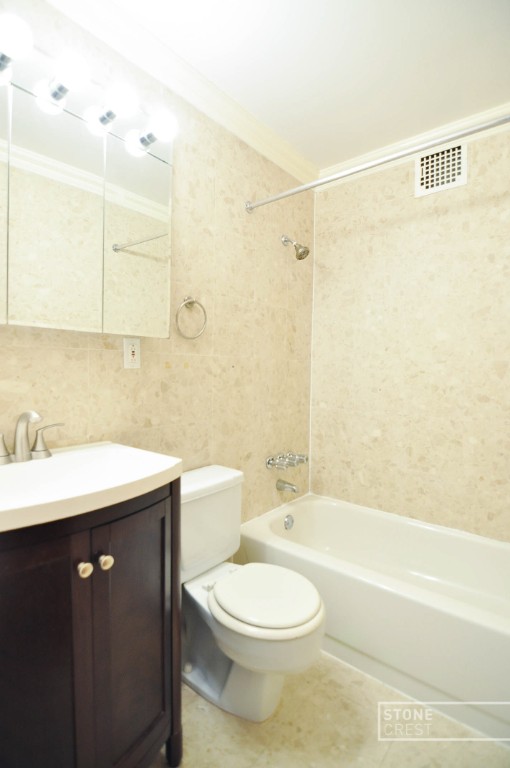 304 West 92nd Street, Unit 5A Manhattan, NY 10025 - Photo 5 of 12 a bathroom with a sink a toilet and shower
