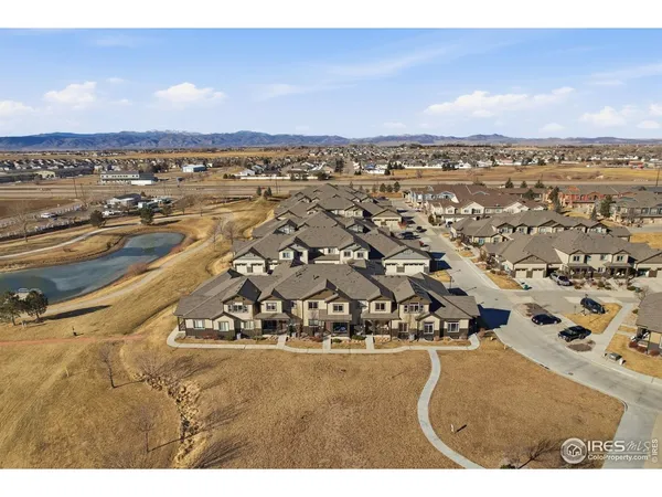 an aerial view of residential building with outdoor space