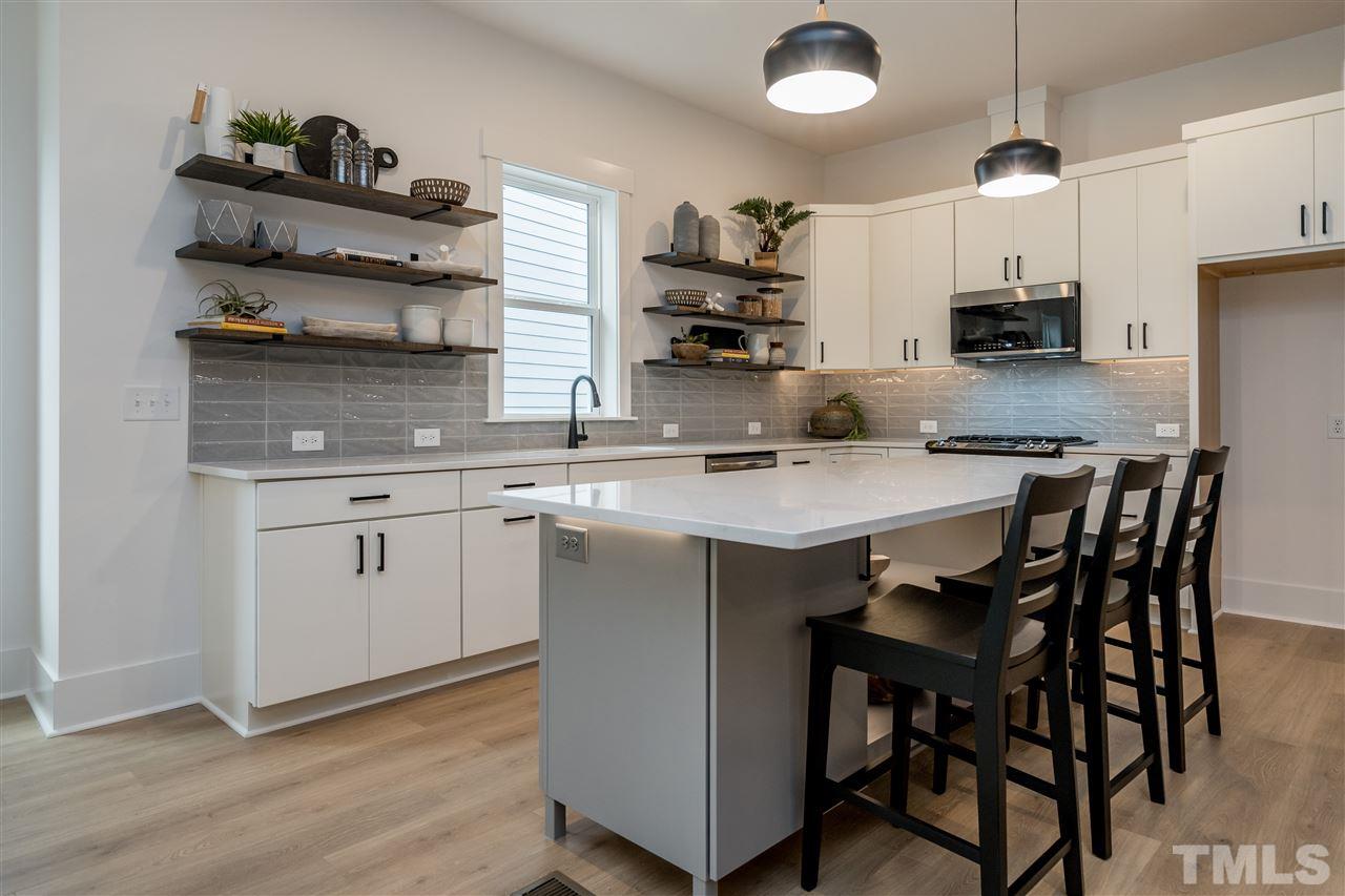 425 Liberty Star Road, Unit LT986 Wendell, NC 27591 - Photo 10 of 30 Kitchen features upgraded Frigidaire Appliance and extra large island