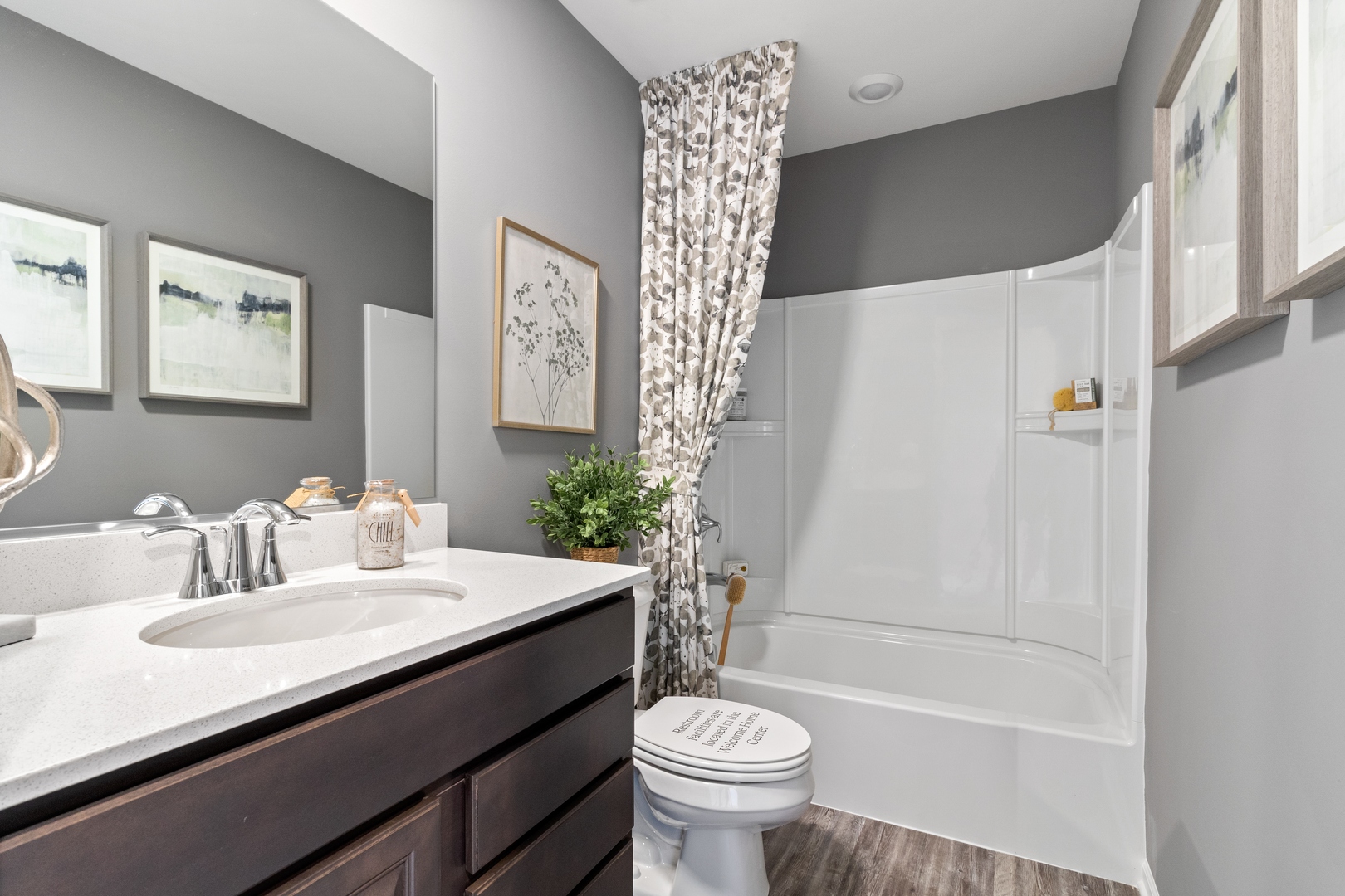 25626 West Springview Drive Plainfield, IL 60586 - Photo 16 of 27 a bathroom with a sink a toilet and a bathtub