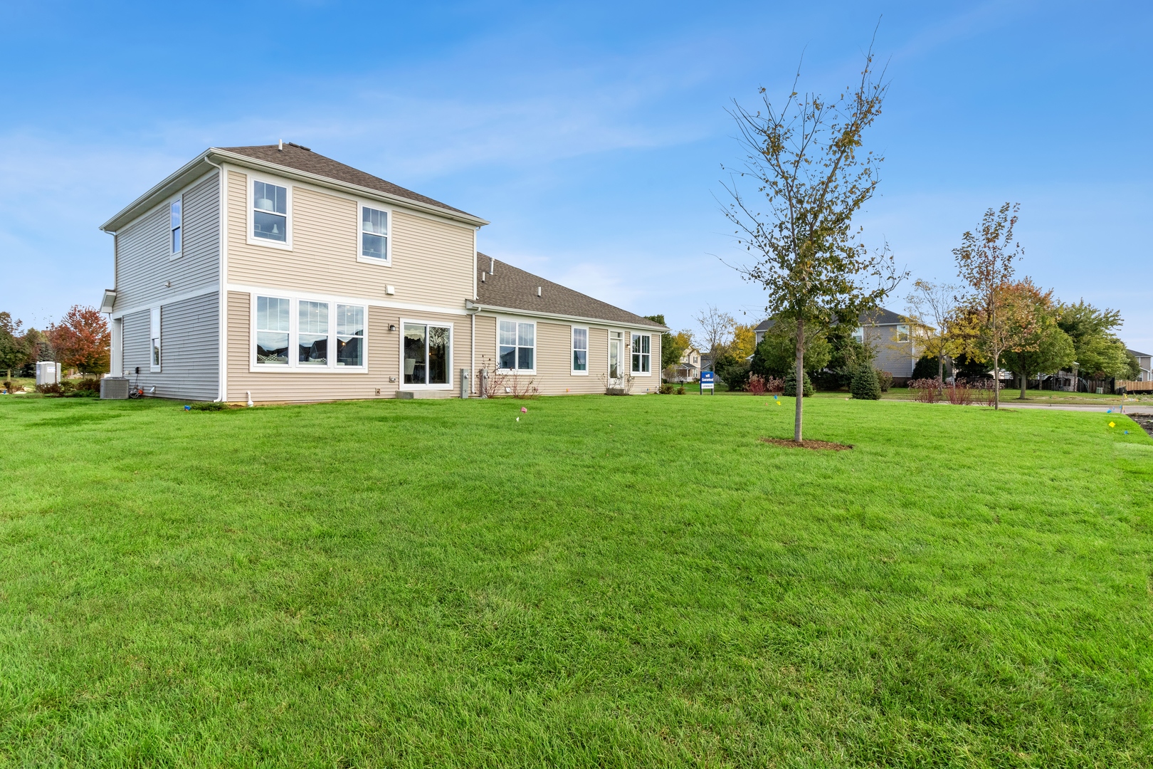 25626 West Springview Drive Plainfield, IL 60586 - Photo 19 of 27 a front view of a house with a yard