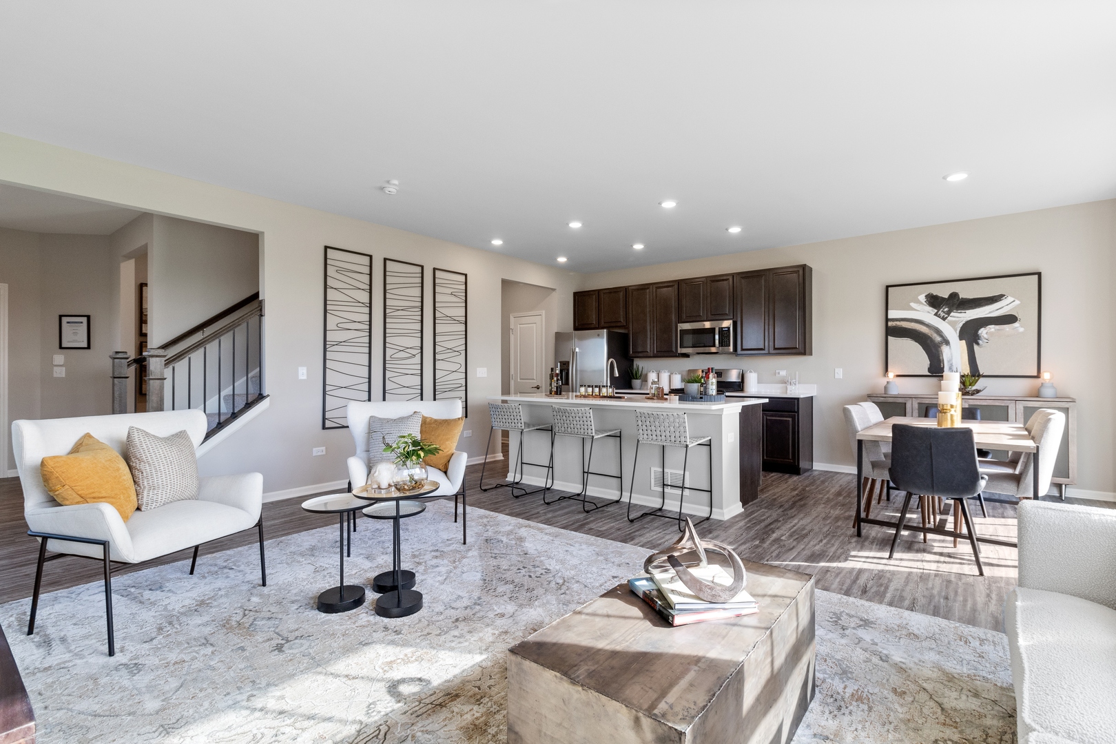 25626 West Springview Drive Plainfield, IL 60586 - Photo 5 of 27 a living room with furniture and kitchen view