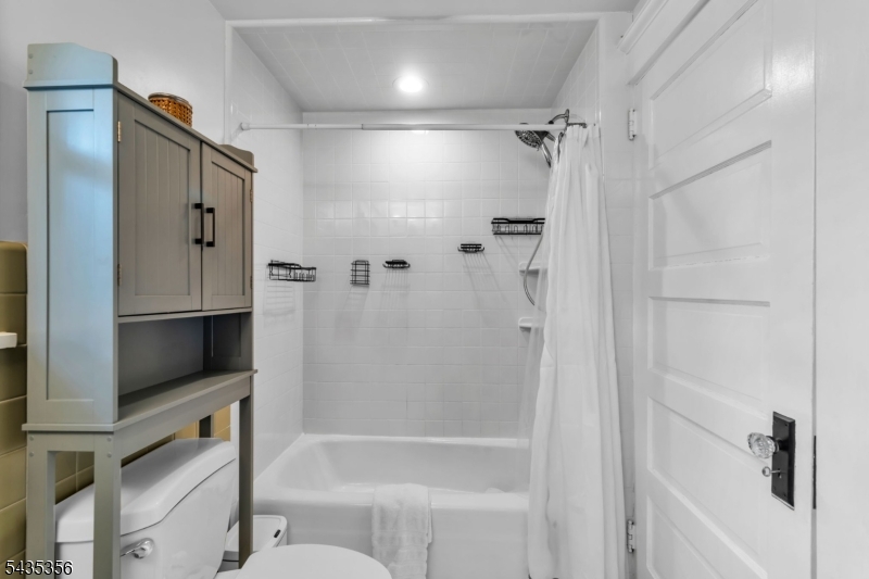 105 Somerville Road Bedminster, NJ 07921 - Photo 24 of 36 a bathroom with a bathtub and a shower