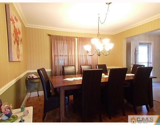 15 Lynnwood Road Edison, NJ 08820 - Photo 2 of 9 a view of a dining room with furniture
