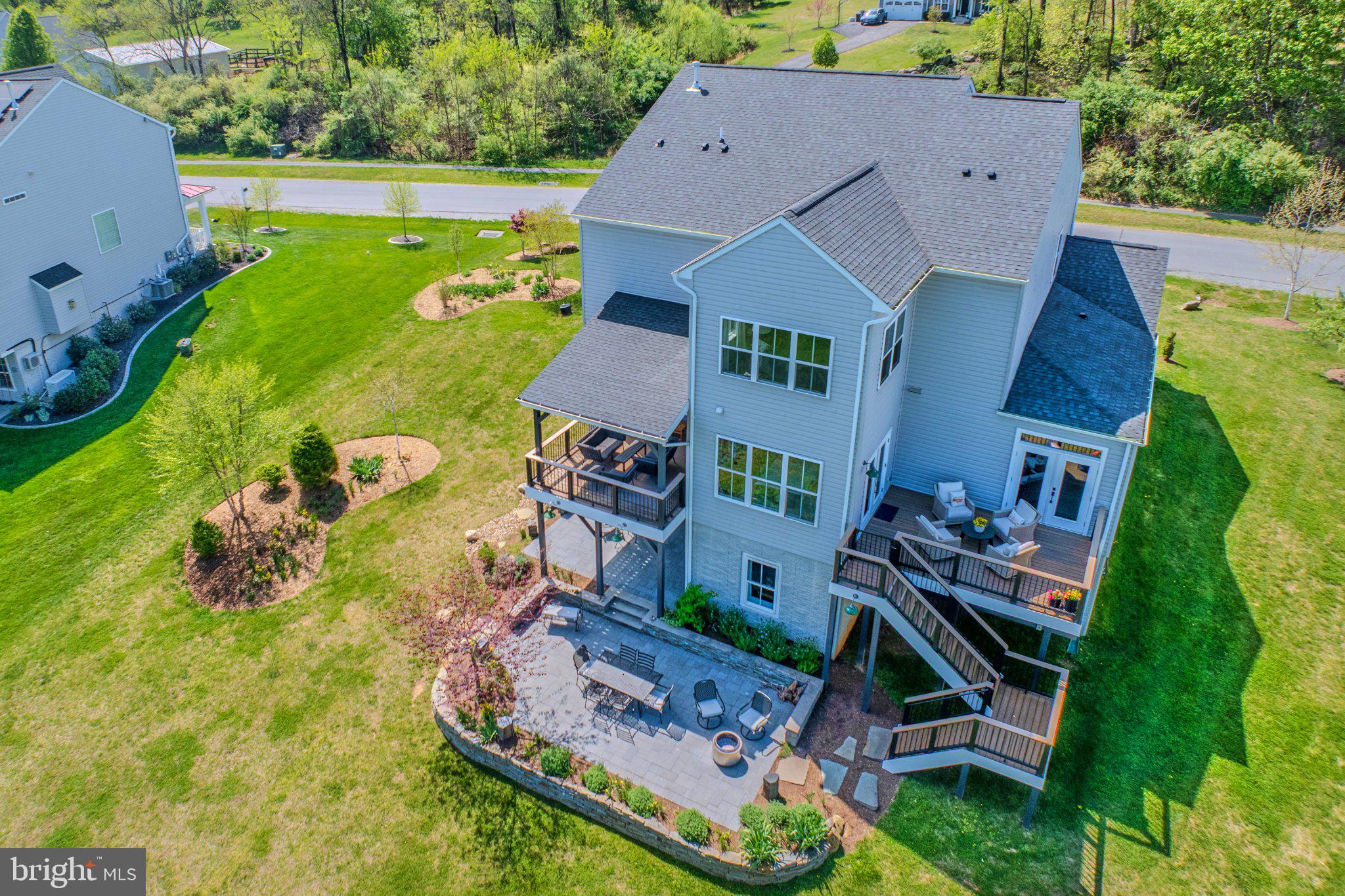 18120 Ridgewood Place Round Hill, VA 20141 - Photo 40 of 46 an aerial view of a house with garden space and street view