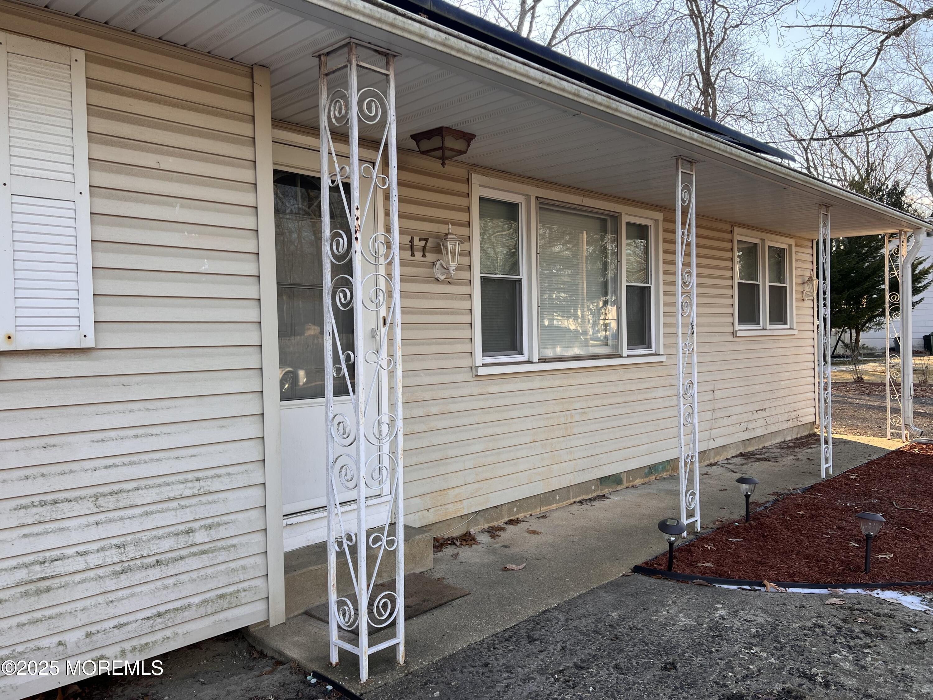 17 Afton Road Jackson, NJ 08527 - Photo 20 of 21 a view of a house with a yard