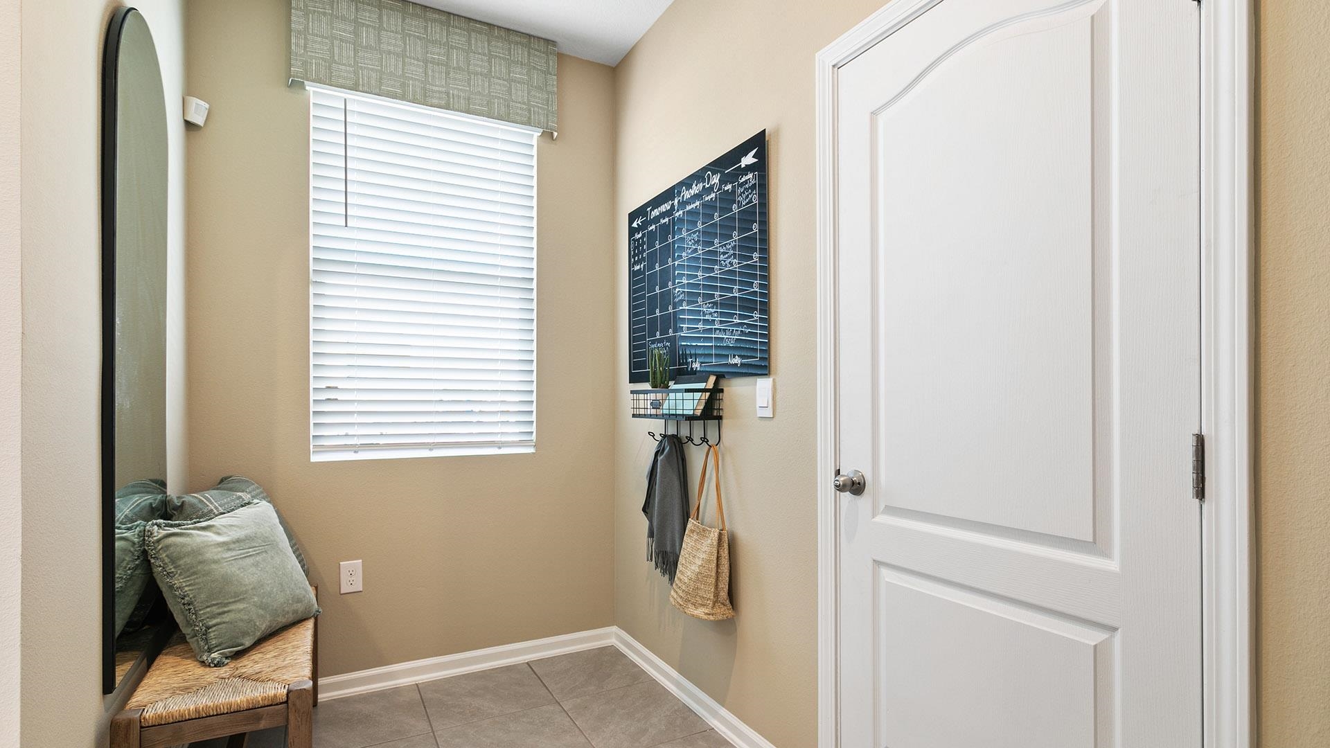 91 Redbud Road Palm Coast, FL 32137 - Photo 11 of 39 a view of a hallway with workspace and a window