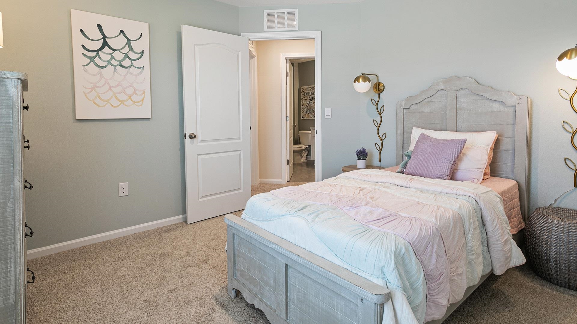 91 Redbud Road Palm Coast, FL 32137 - Photo 23 of 39 a bedroom with a bed and painting on the wall
