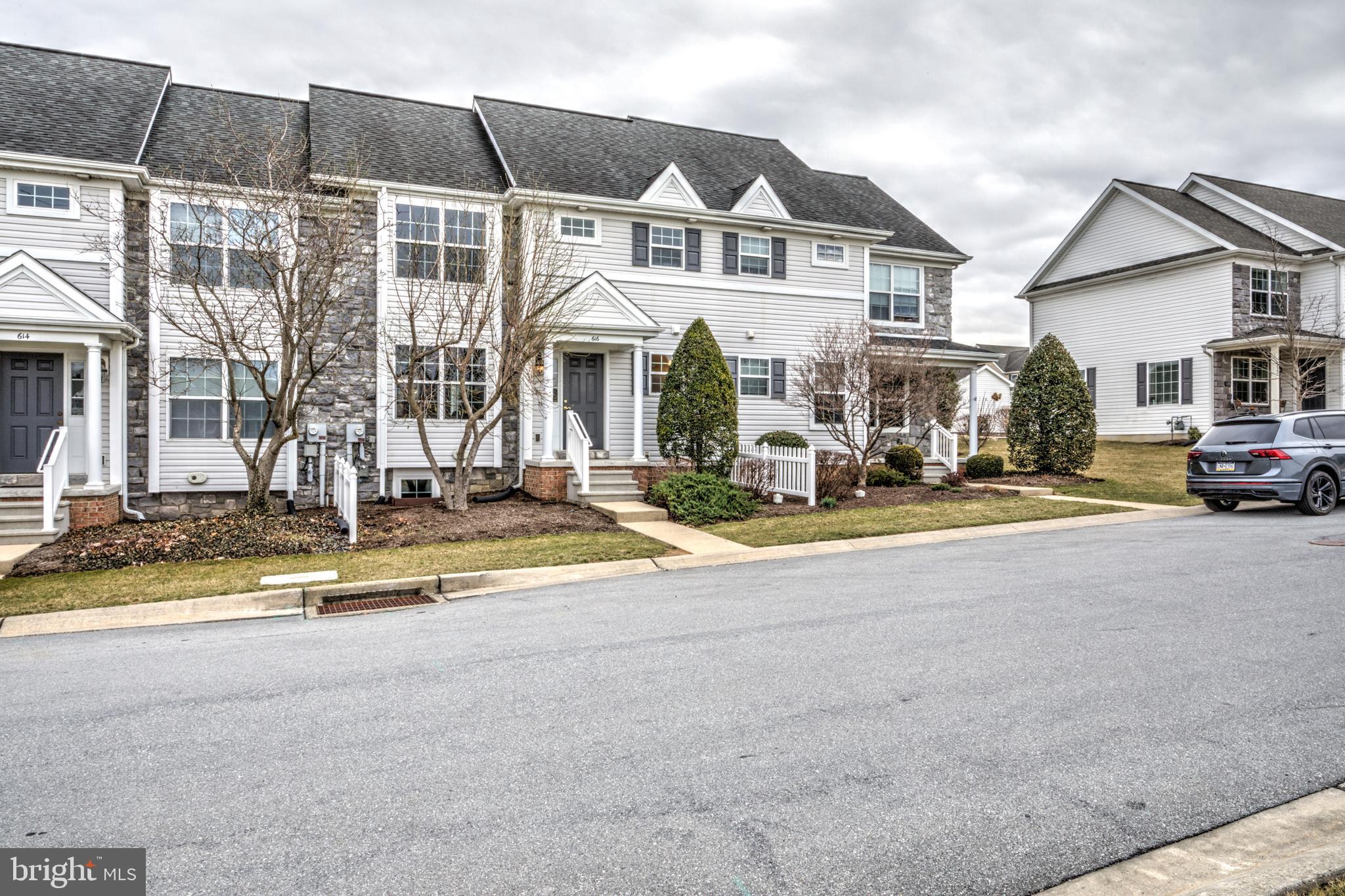 616 Wagonwheel Road Lititz, PA 17543 - Photo 3 of 40 a view of a white house with a ocean view