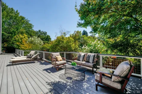 a view of sitting area with furniture and outdoor seating