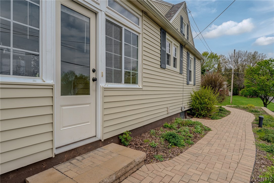 110 Ardmore Road Geddes, NY 13219 - Photo 4 of 50 Walkway leads to the fabulous Breezeway!