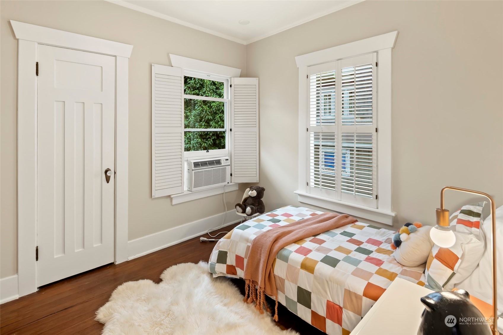 2226 12th Avenue East Seattle, WA 98102 - Photo 18 of 37 a bedroom with bed and a window