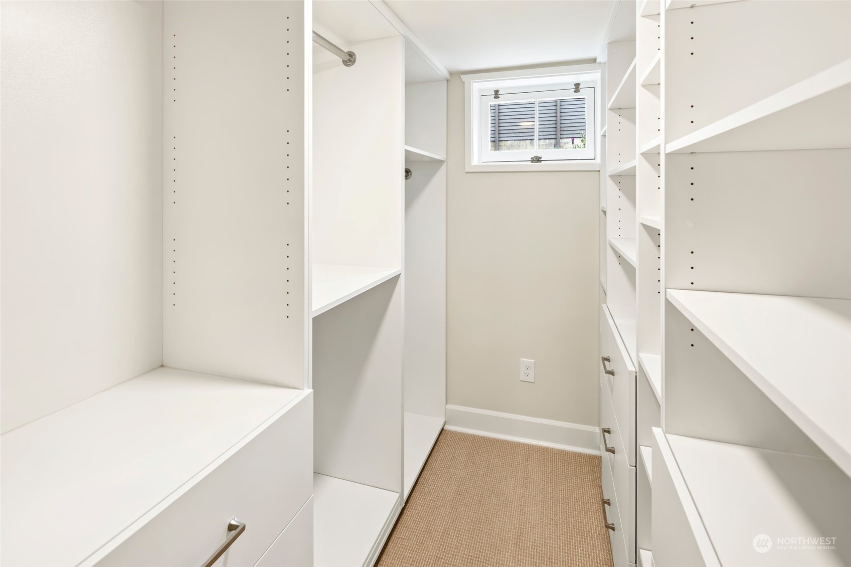 2226 12th Avenue East Seattle, WA 98102 - Photo 23 of 37 a view of a hallway with white walls and a white door