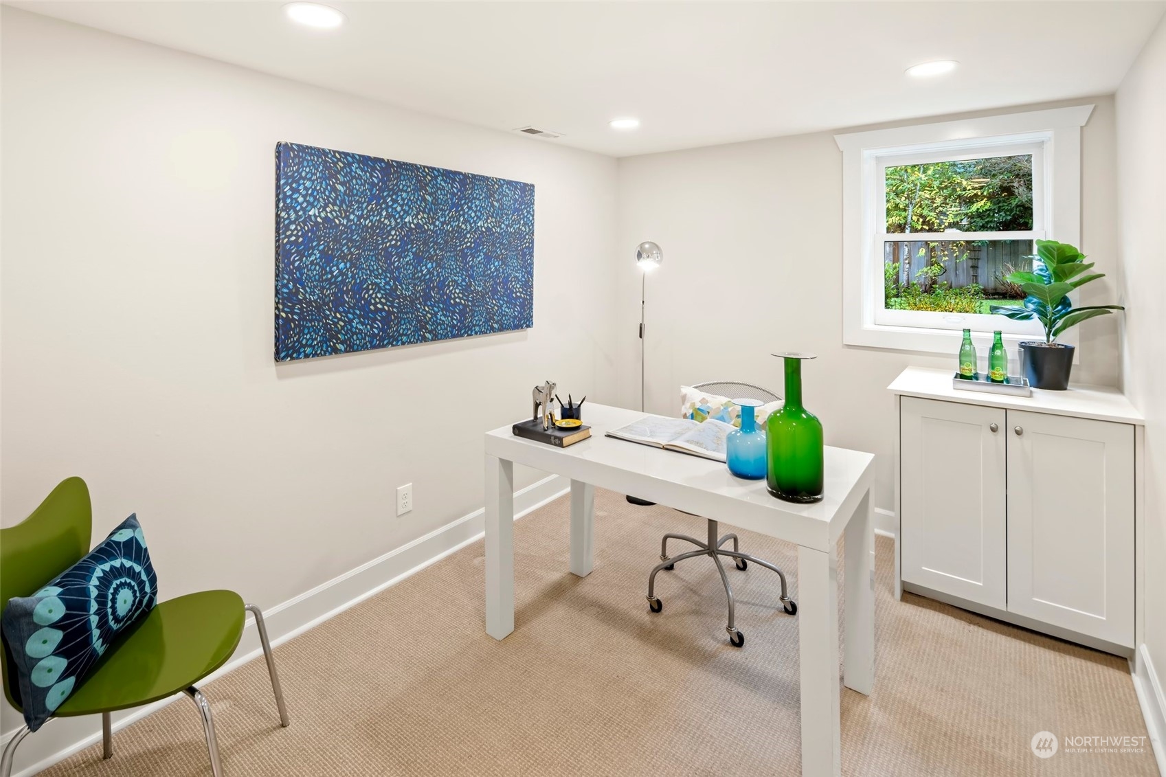 2226 12th Avenue East Seattle, WA 98102 - Photo 26 of 37 a workspace with furniture and a potted plant
