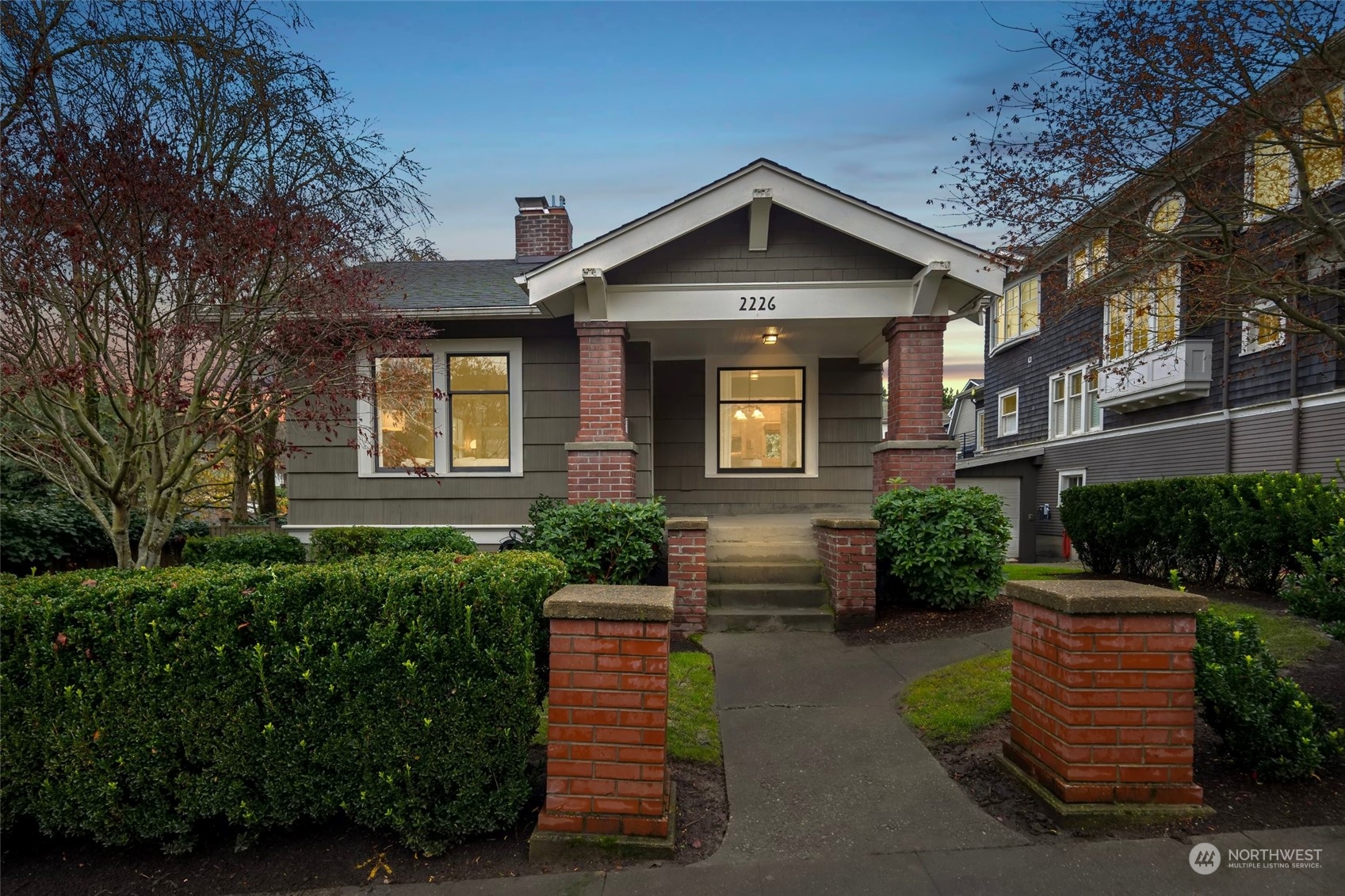 2226 12th Avenue East Seattle, WA 98102 - Photo 33 of 37 a front view of a house with a yard