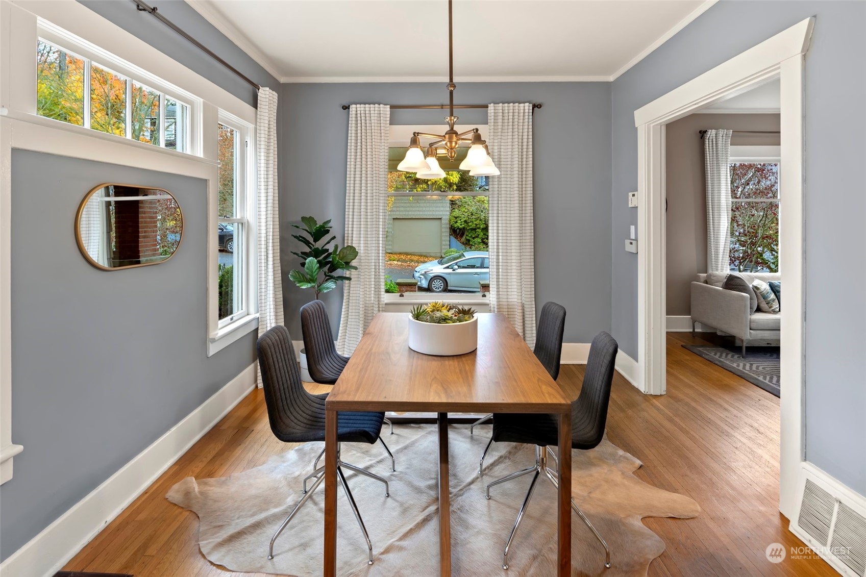 2226 12th Avenue East Seattle, WA 98102 - Photo 7 of 37 a view of a dining room with furniture window and wooden floor