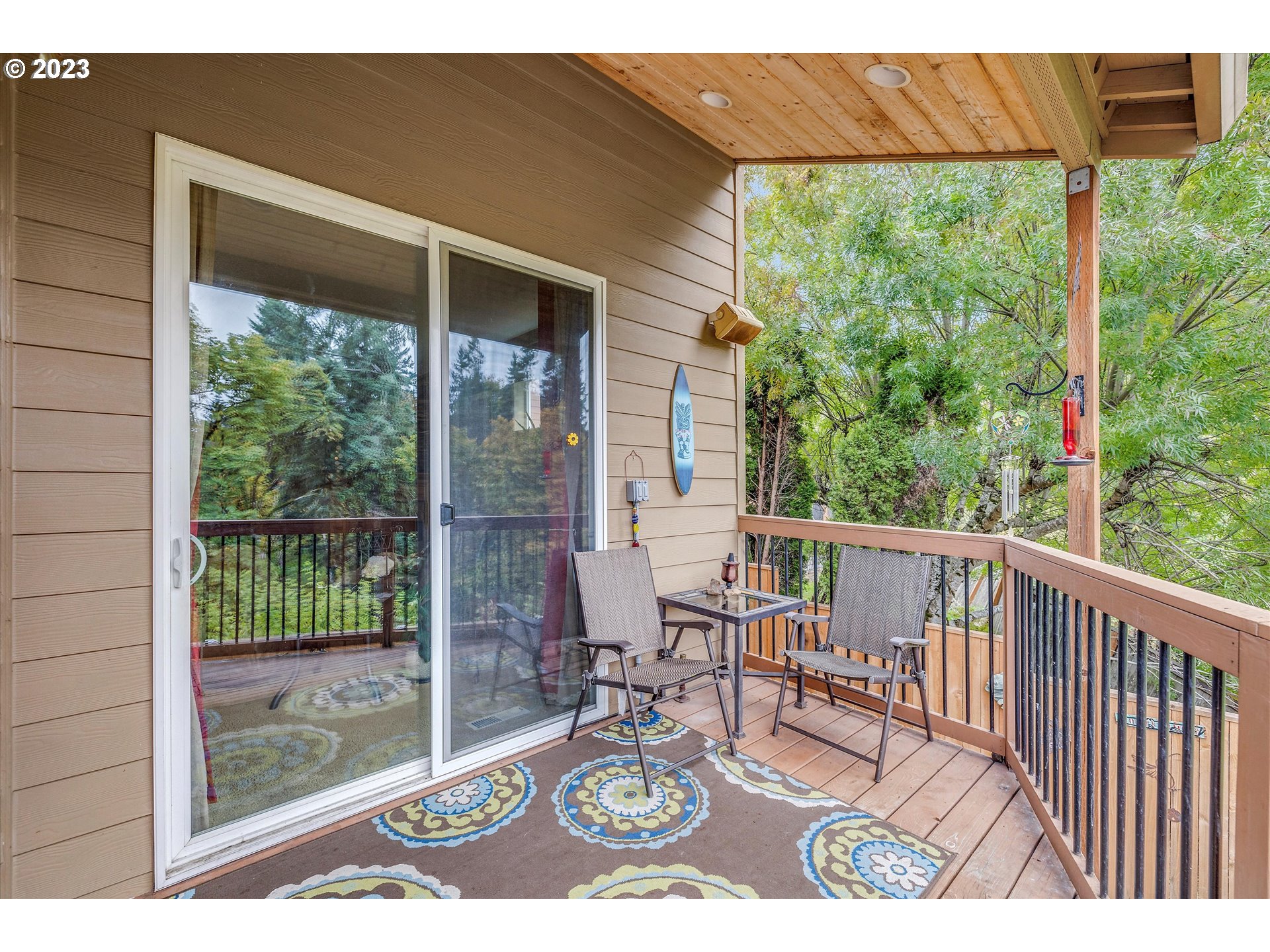 16472 Southeast Siri Loop Damascus, OR 97089 - Photo 31 of 41 a view of a patio with a dining table and chairs
