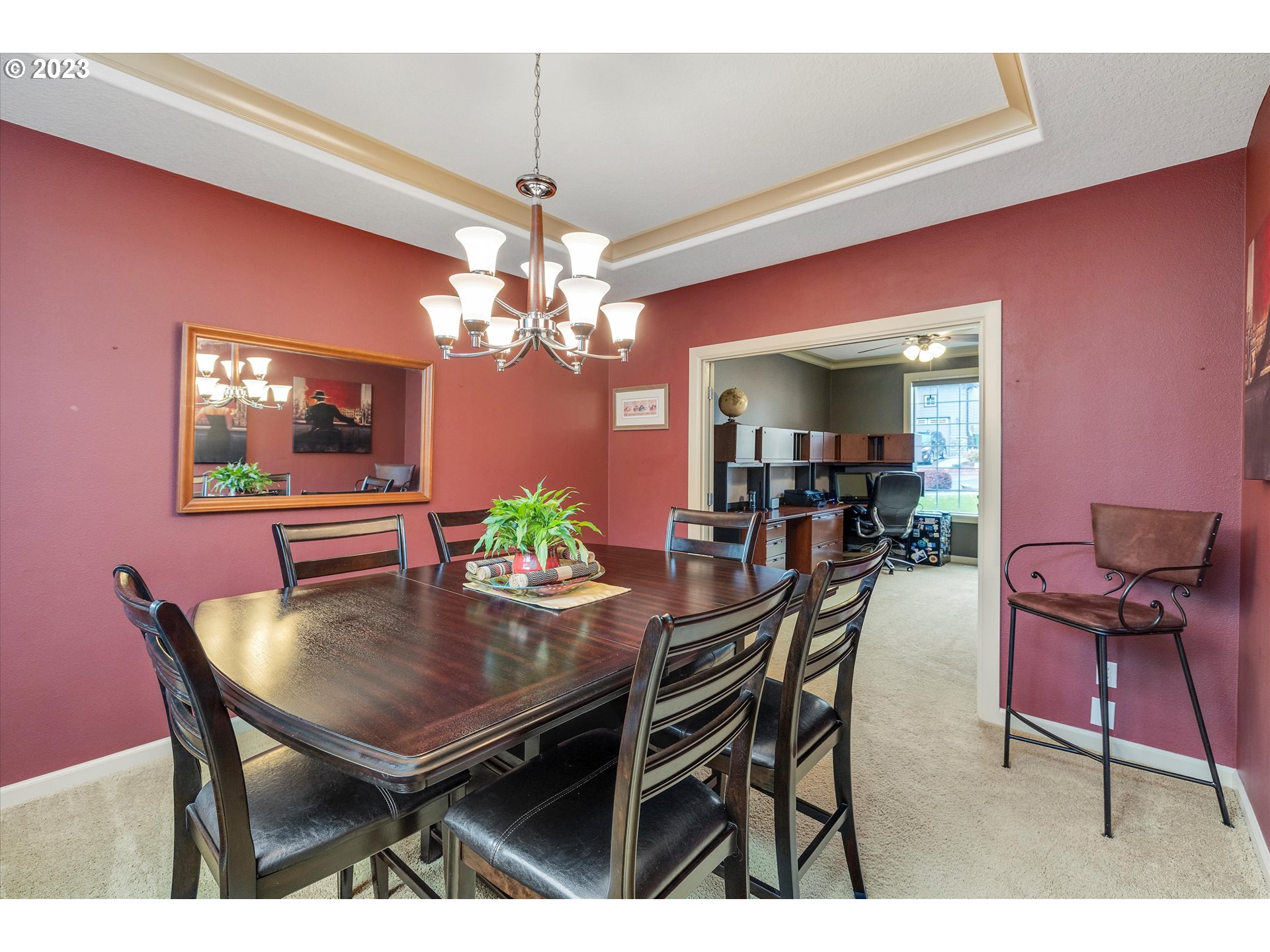 16472 Southeast Siri Loop Damascus, OR 97089 - Photo 9 of 41 a view of a dining room with furniture and chandelier