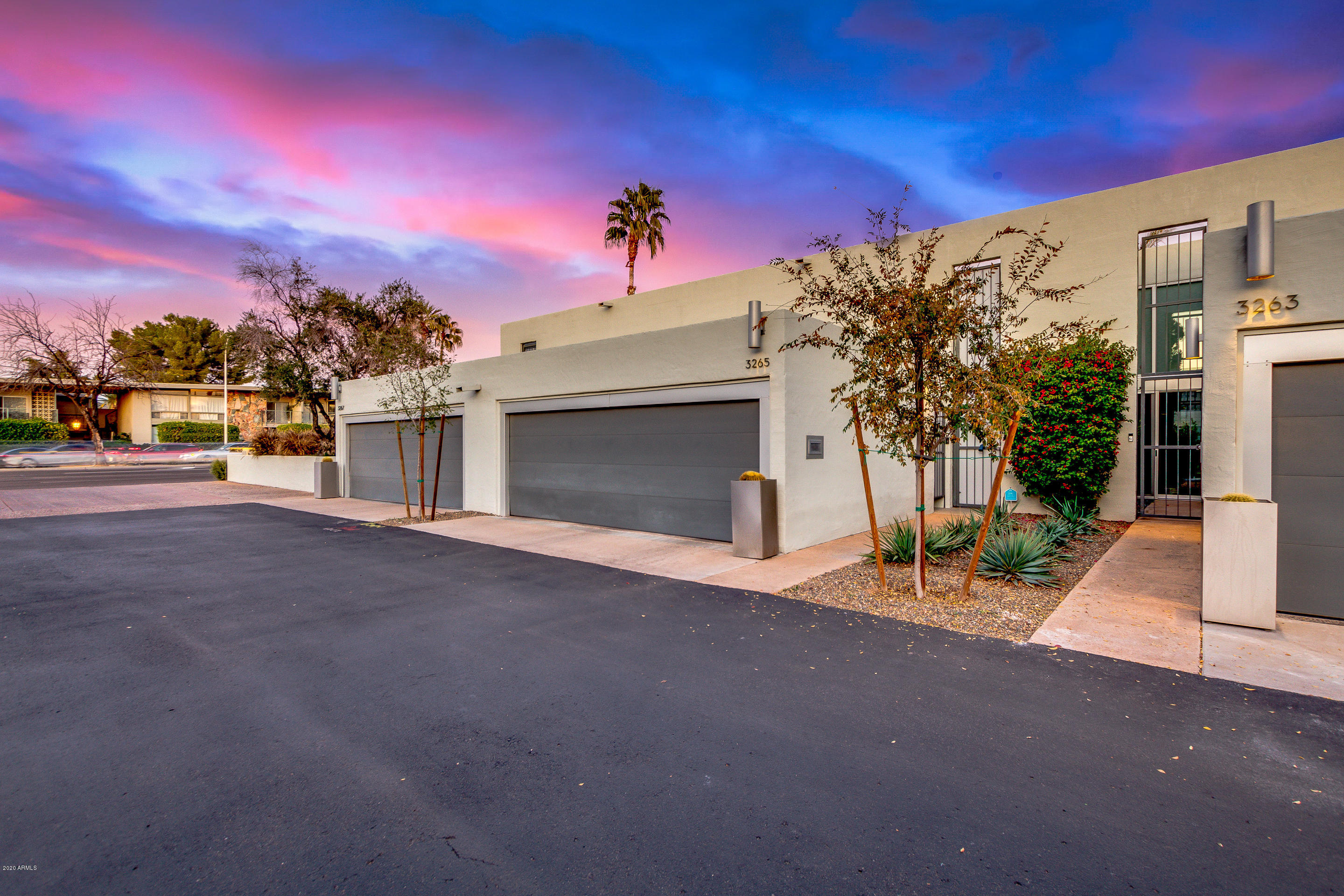 3265 East Camelback Road Phoenix, AZ 85018 - Photo 1 of 1 a view of a road with a building in the background