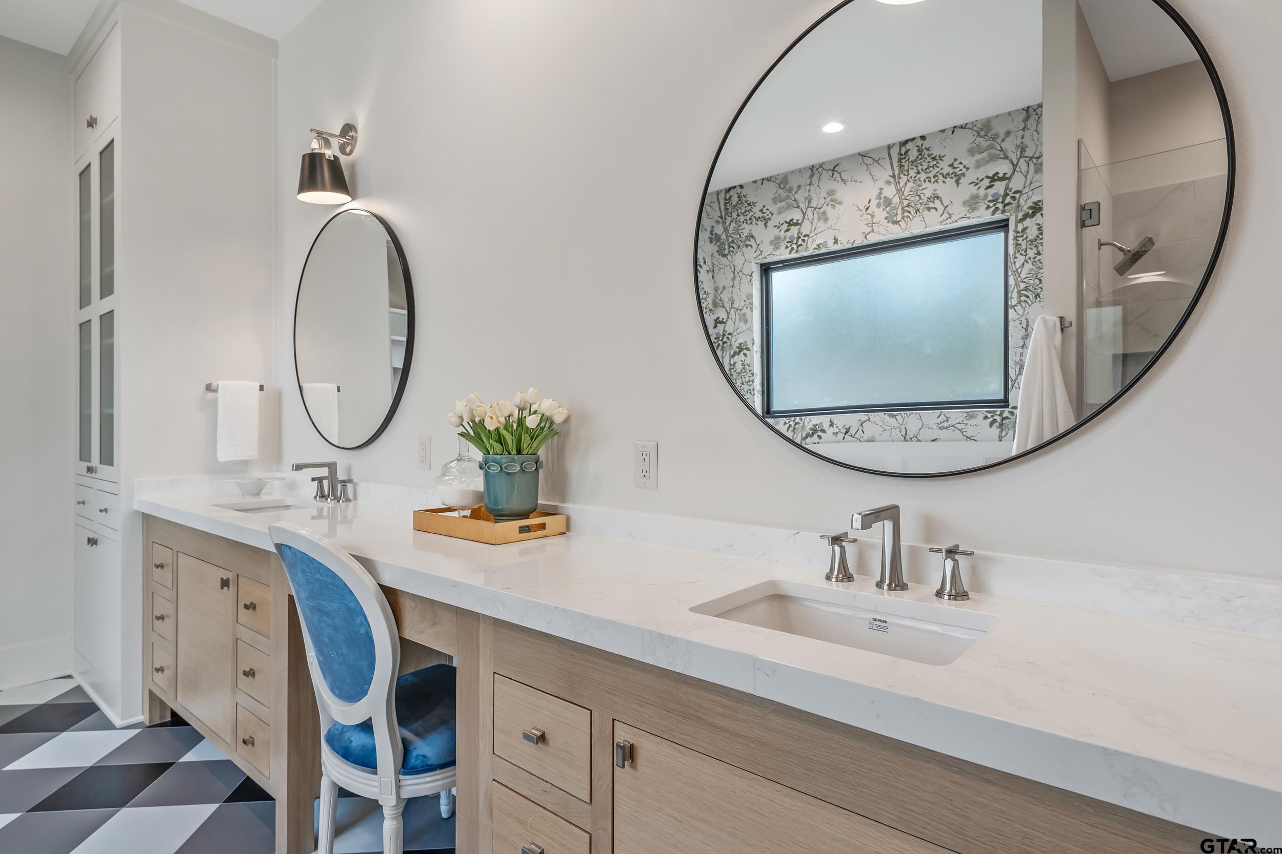 1409 Canopy Cv Court Tyler, TX 75703 - Photo 22 of 40 a bathroom with a sink mirror and vanity