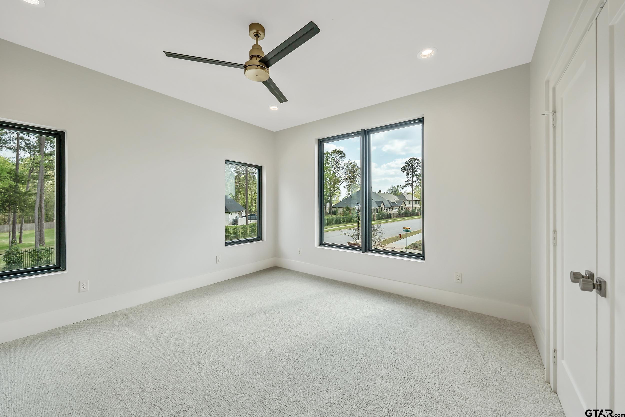 1409 Canopy Cv Court Tyler, TX 75703 - Photo 29 of 40 a view of room with window and ceiling fan