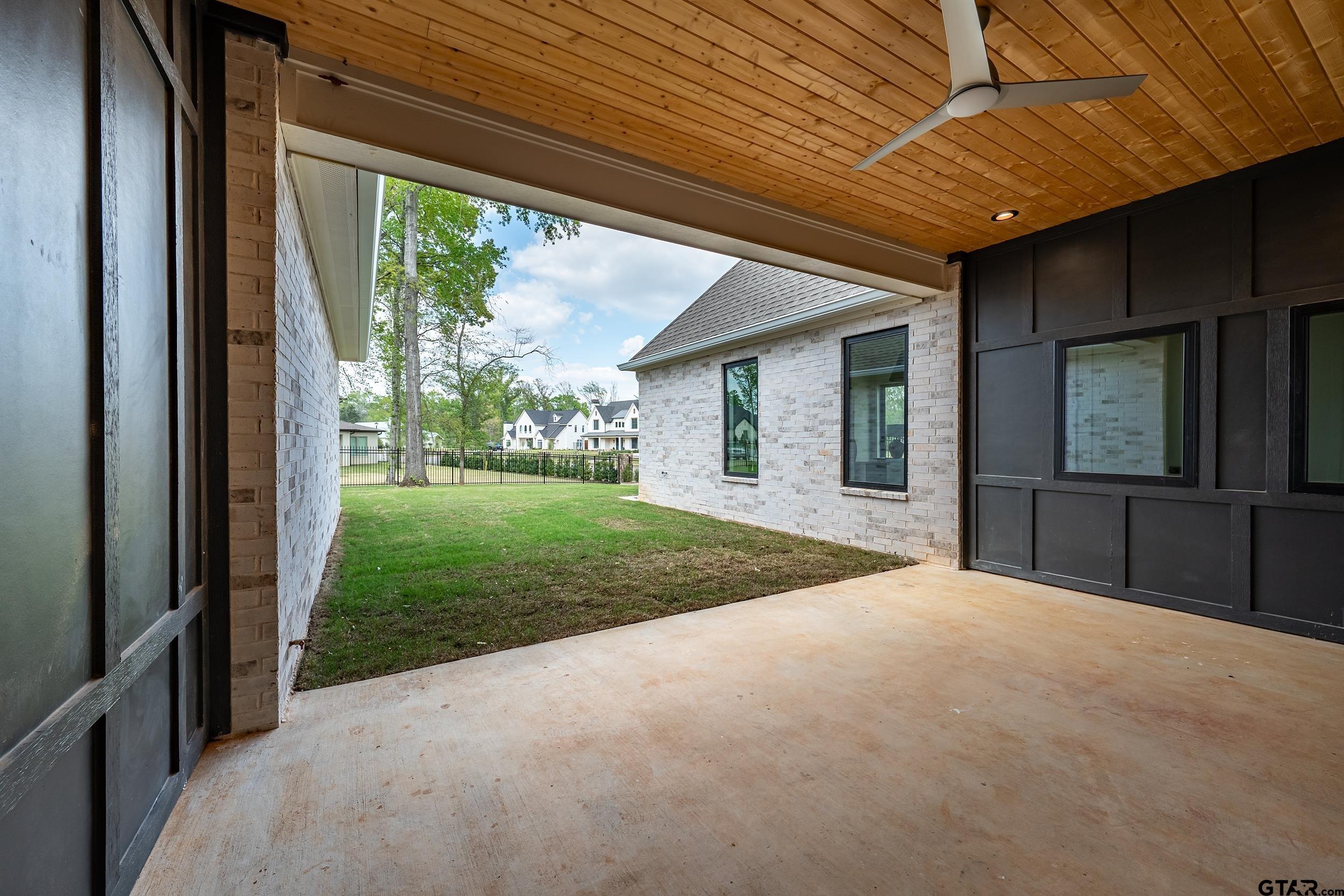 1409 Canopy Cv Court Tyler, TX 75703 - Photo 33 of 40 a view of a backyard of a house