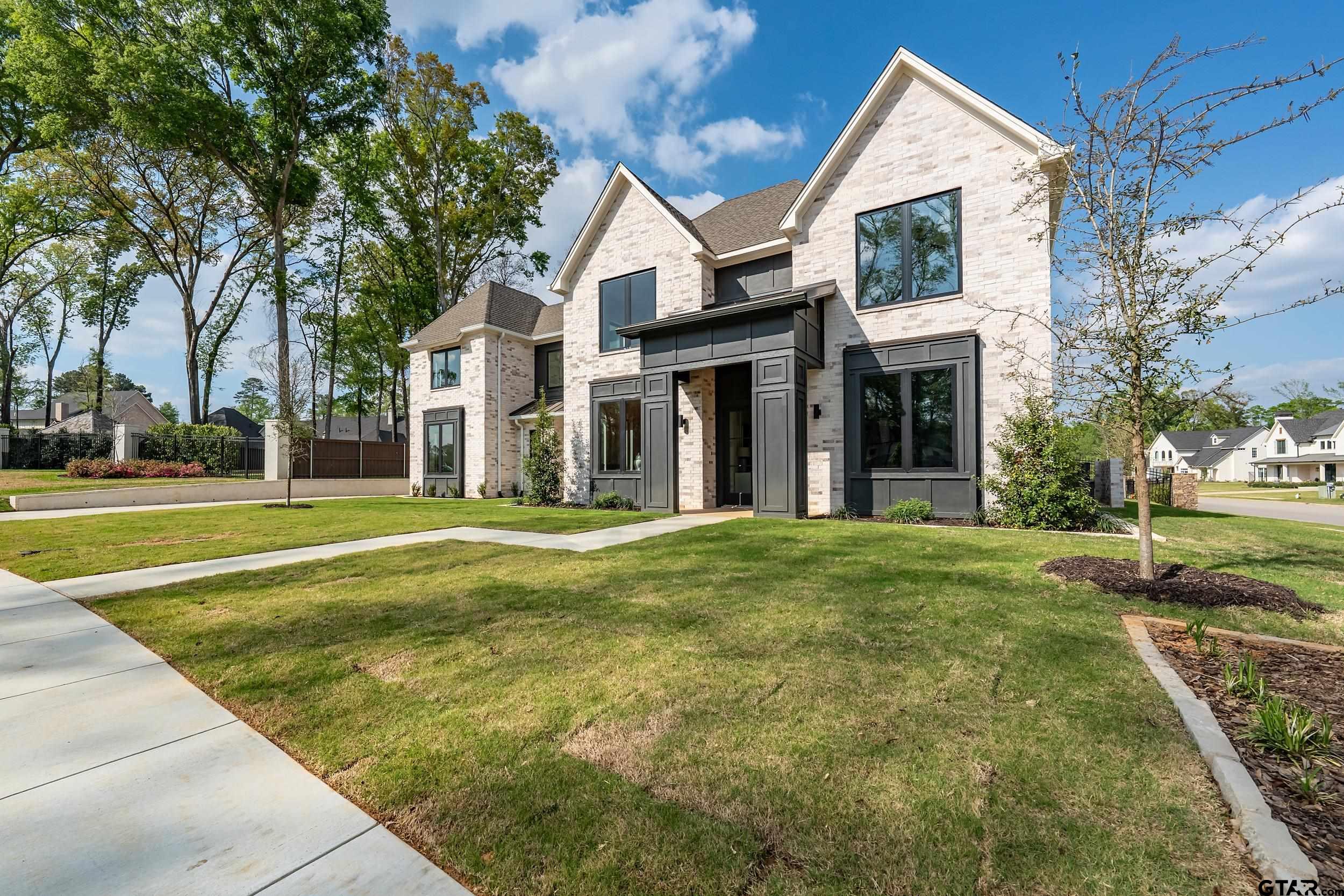 1409 Canopy Cv Court Tyler, TX 75703 - Photo 39 of 40 a view of a house with a yard