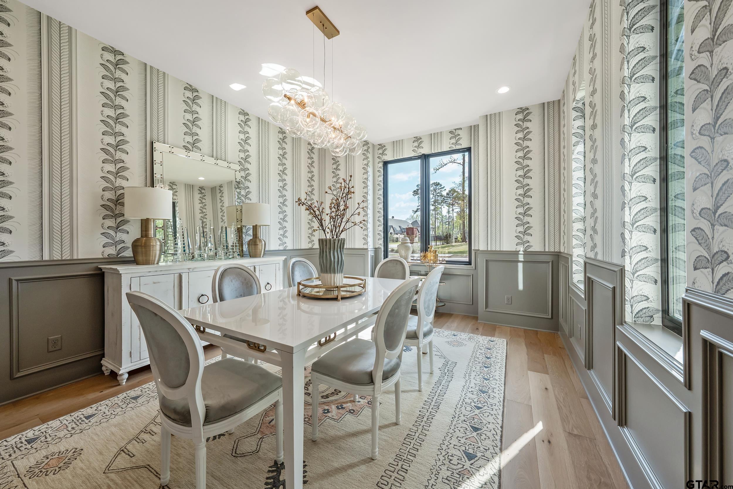 1409 Canopy Cv Court Tyler, TX 75703 - Photo 5 of 40 a view of a dining room with furniture and a chandelier