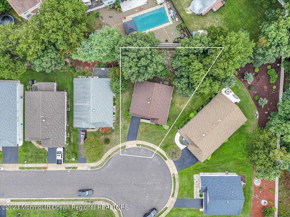 169 Sandpiper Road Barnegat, NJ 08005 - Photo 2 of 35 an aerial view of a house with a yard and garden