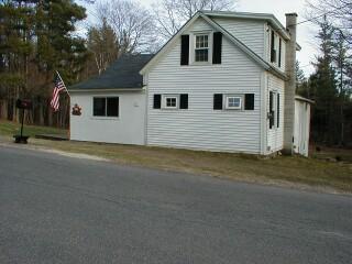 390 Chapel Road Savoy, MA 01256 - Photo 1 of 2 a view of a house with a yard