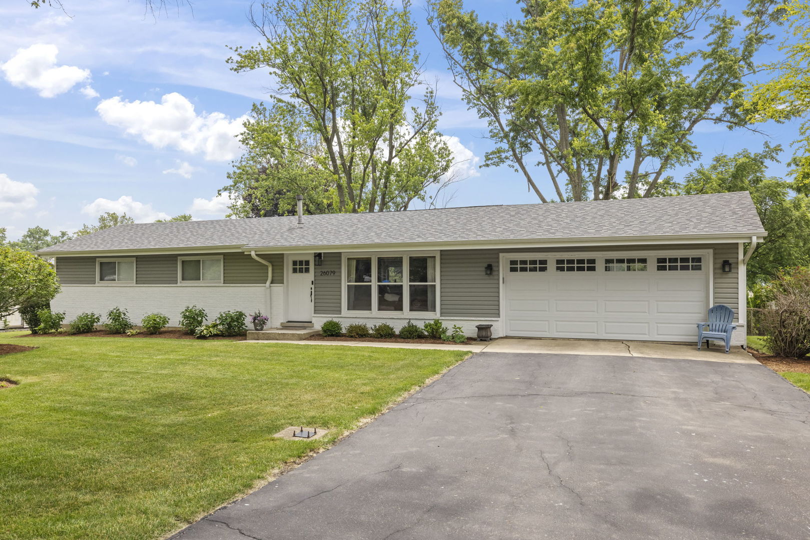 26-w079 Thomas Road Wheaton, IL 60187 - Photo 1 of 32 front view of a house with a yard