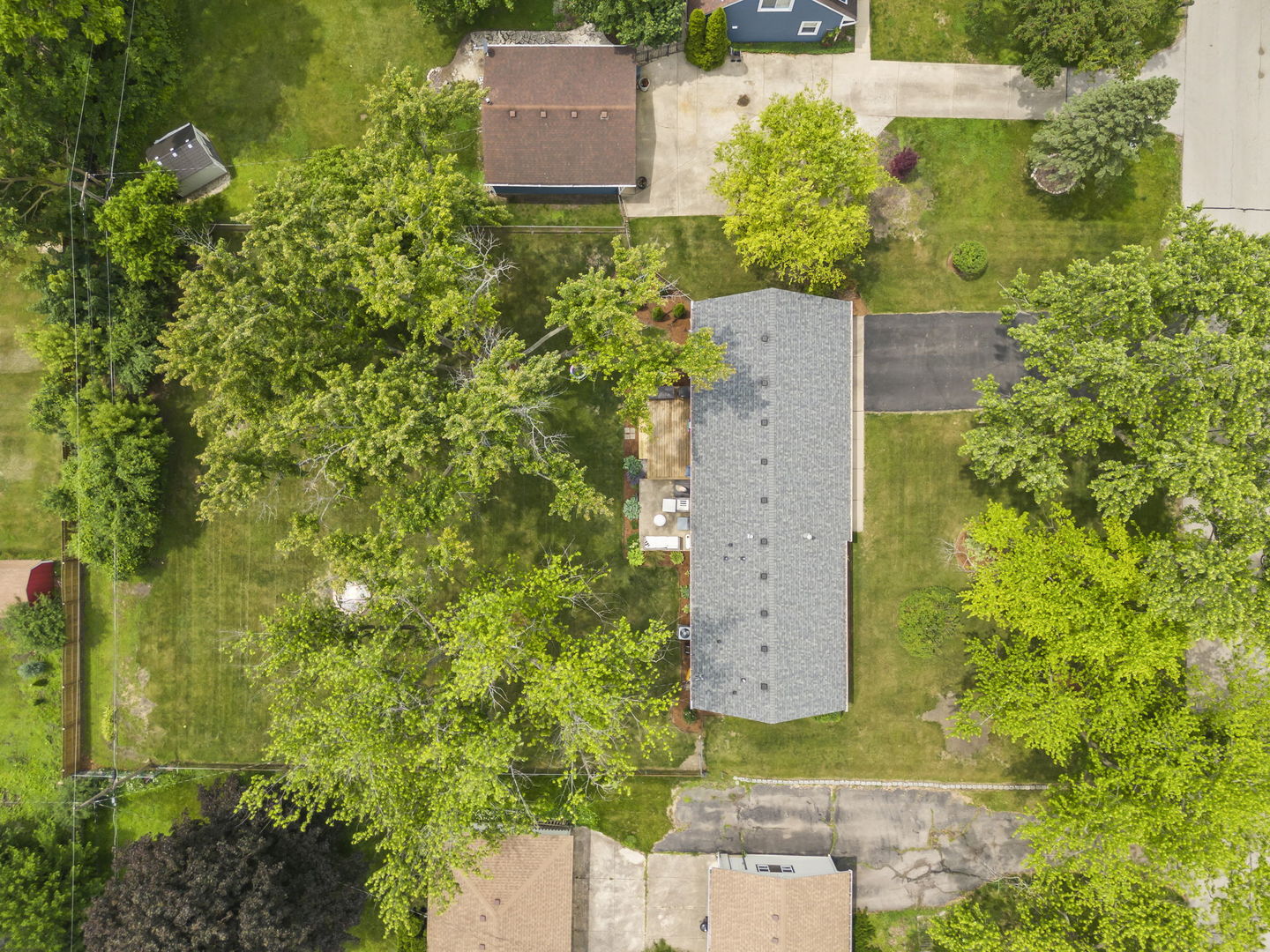 26-w079 Thomas Road Wheaton, IL 60187 - Photo 30 of 32 an aerial view of a house with a yard
