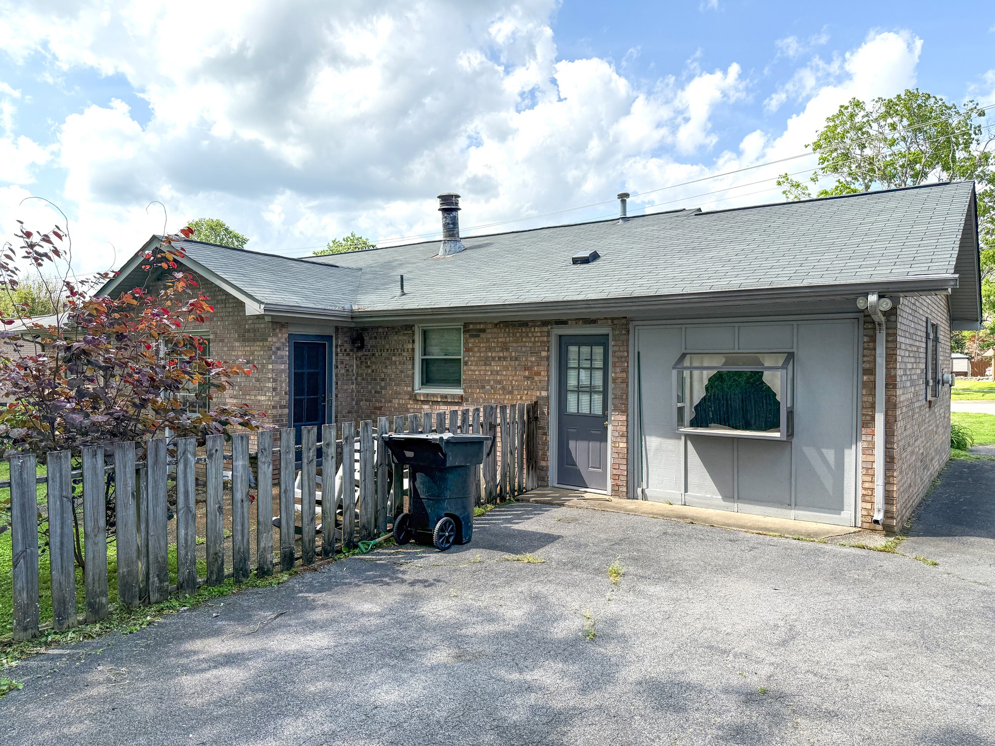 1431 Avon Road Murfreesboro, TN 37129 - Photo 3 of 4 a front view of a house with a garage