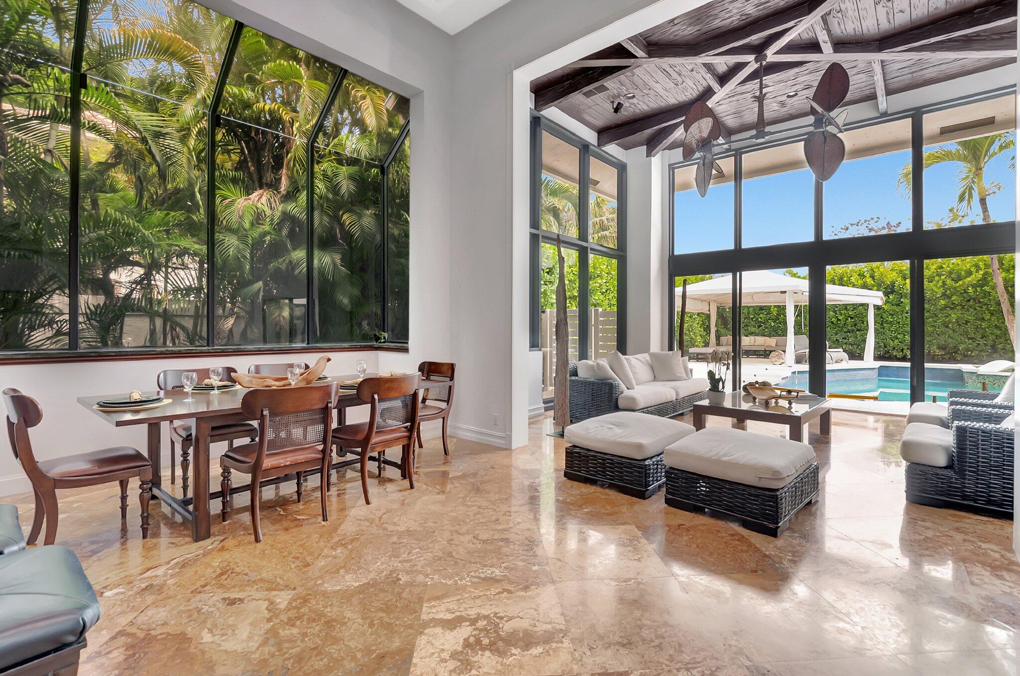 2393 Northwest 59th Street Boca Raton, FL 33496 - Photo 17 of 87 breakfast nook/seating area facing pool
