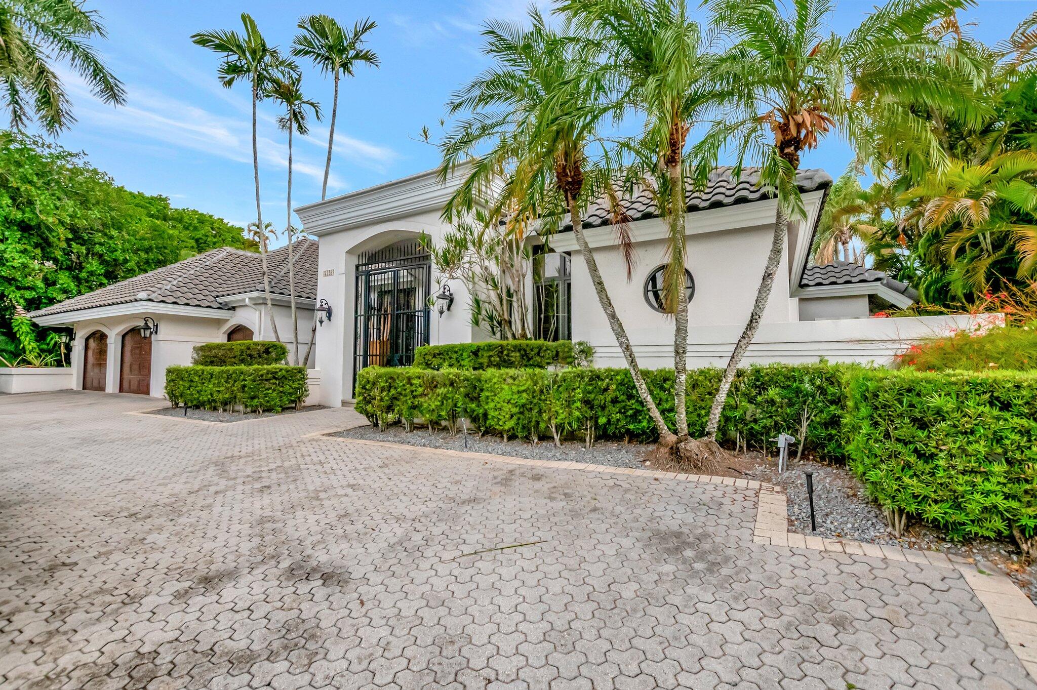 2393 Northwest 59th Street Boca Raton, FL 33496 - Photo 3 of 87 driveway