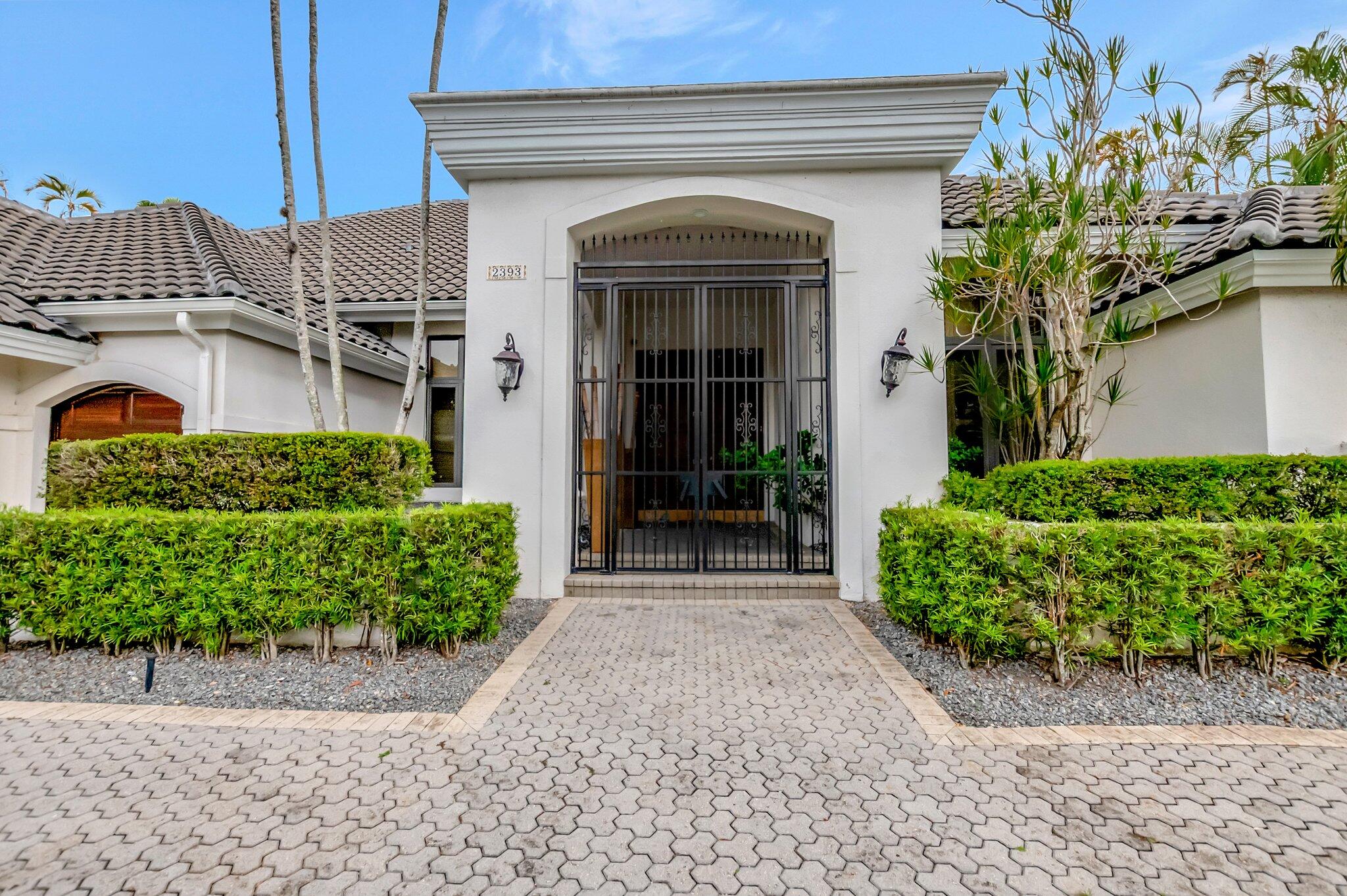 2393 Northwest 59th Street Boca Raton, FL 33496 - Photo 4 of 87 front entry