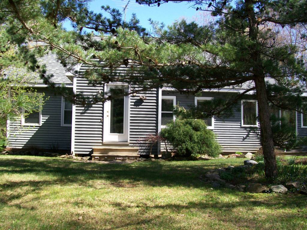 5 Iron Mine Road West Stockbridge, MA 01266 - Photo 2 of 19 a view of a backyard with plants and large tree