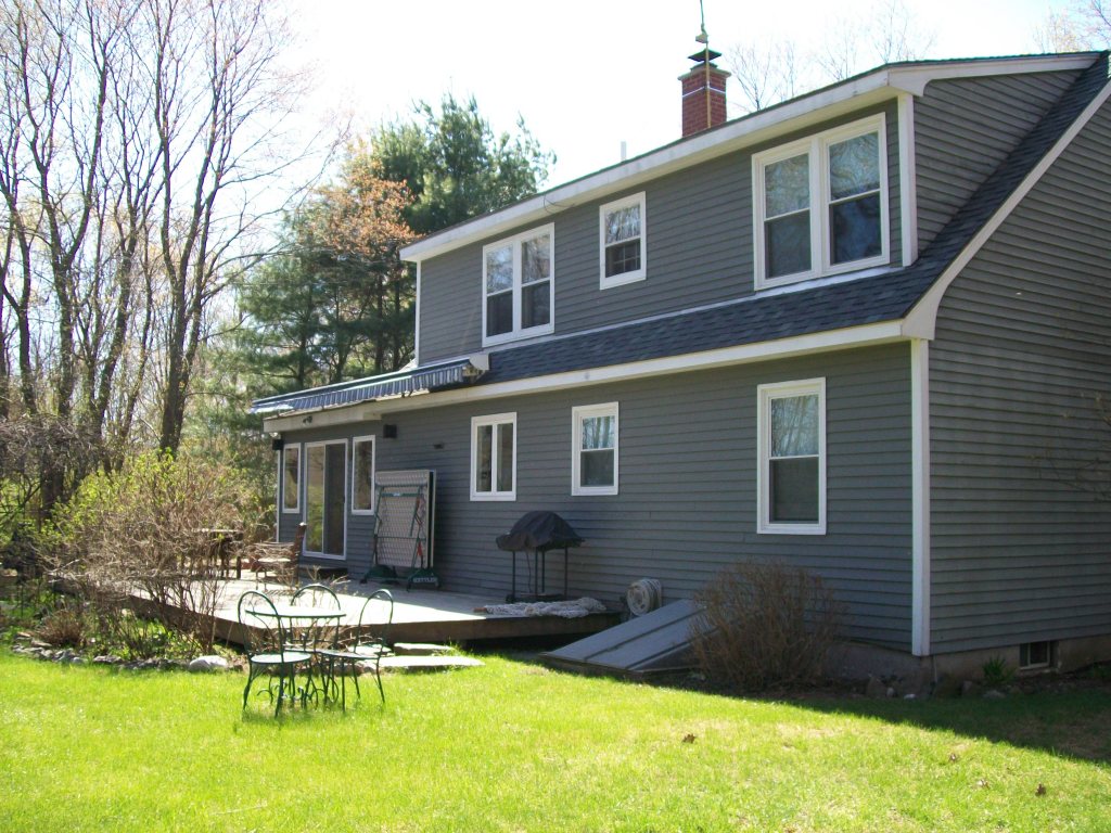 5 Iron Mine Road West Stockbridge, MA 01266 - Photo 3 of 19 a view of a house with pool and chairs