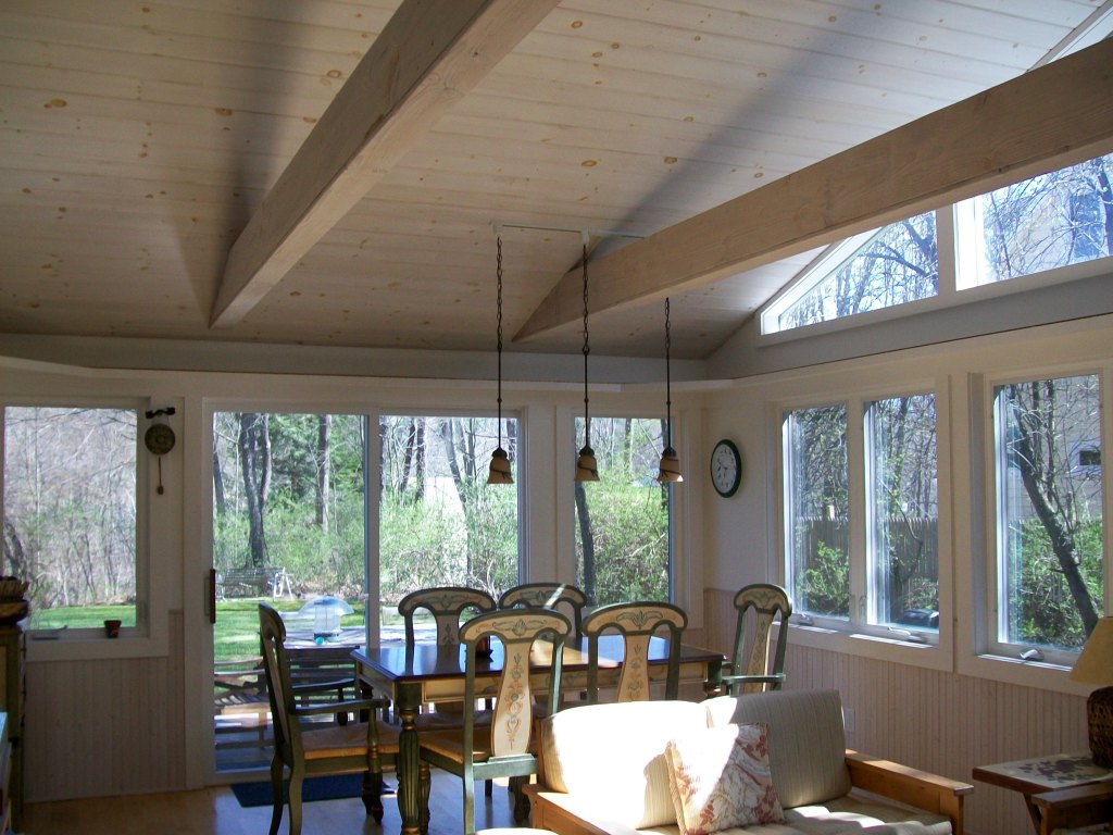 5 Iron Mine Road West Stockbridge, MA 01266 - Photo 9 of 19 a view of a dining room with furniture large windows and wooden floor