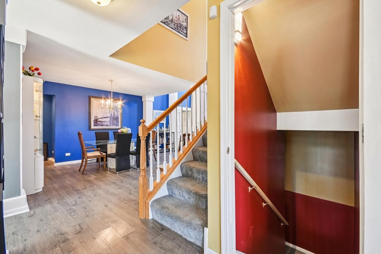 1739 Newbridge Circle Elgin, IL 60123 - Photo 37 of 42 a view of staircase with furniture and stairs