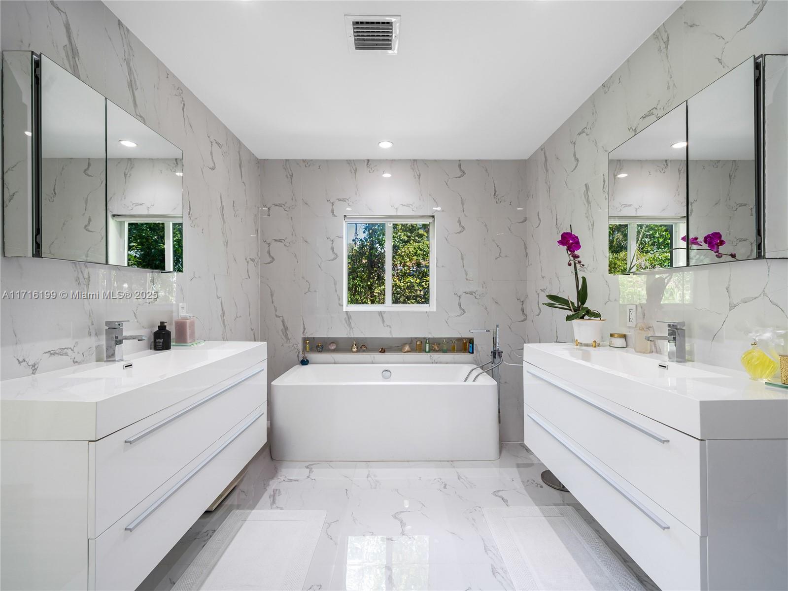 203 Ridgewood Road Coral Gables, FL 33133 - Photo 20 of 46 a view of bathroom with dual sinks
