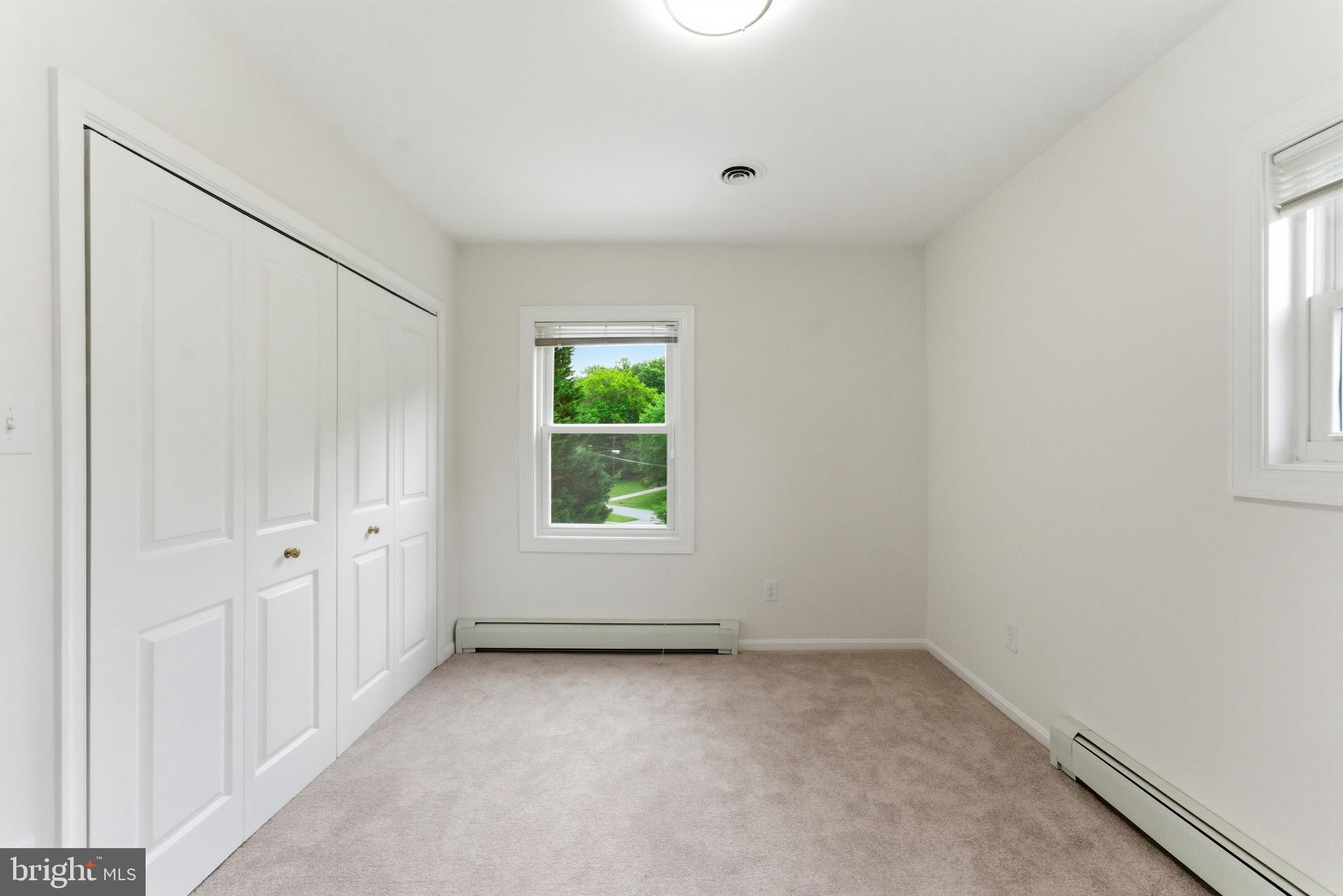 2100 Edgewater Parkway Silver Spring, MD 20903 - Photo 21 of 46 an empty room with windows