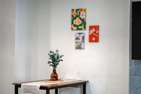 a vase of flowers sitting on a table