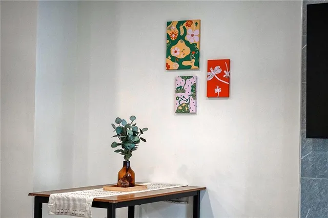 a vase of flowers sitting on a table