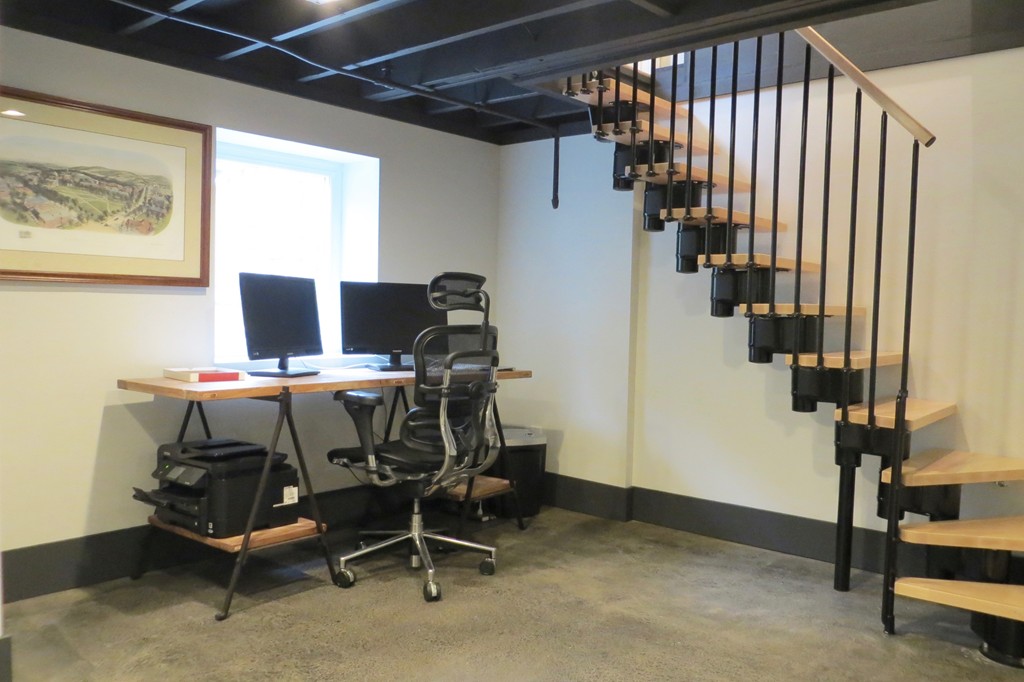 12 Back River Road Amesbury, MA 01913 - Photo 17 of 30 a view of a workspace with furniture and stairs