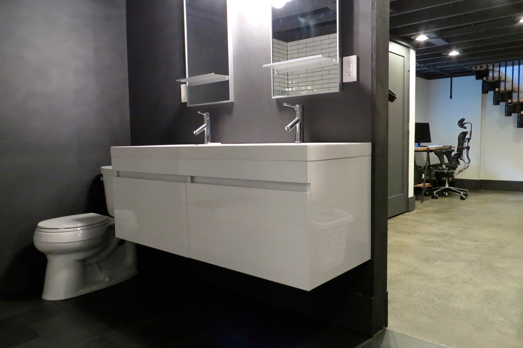 12 Back River Road Amesbury, MA 01913 - Photo 23 of 30 a bathroom with a sink toilet and a mirror